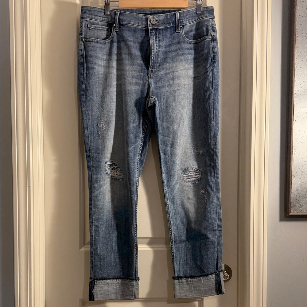 White House Black Market Blue Ankle Jeans with Sparkle behind distressed